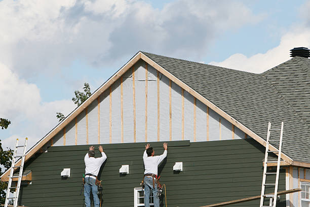 Professional Storm Damage Siding Repair technician working in Riverside, CT